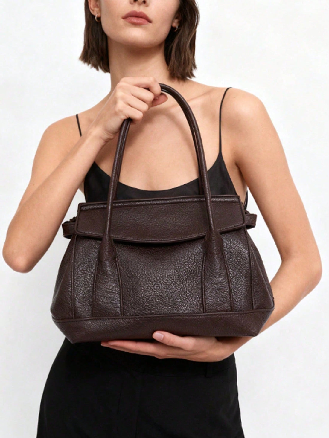 Elevate your everyday carry with this chic city bag that's as versatile as you are. Crafted from premium PU leather and soft suede, it strikes the perfect balance between sophistication and comfort. The adjustable shoulder strap lets you customize your fit, whether you're rushing to the office, heading out for a date night, or exploring the city. Spacious enough for your essentials yet compact enough to keep things streamlined, this bag is your new go-to accessory. Plus, it makes an absolutely stellar gift 