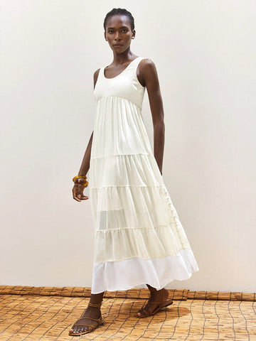 This playful apricot and white color block dress is your go-to for sunny beach days and casual summer fun. Featuring a flattering U-neck and breezy sleeveless A-line silhouette, it keeps you cool while turning heads. Effortlessly stylish and comfy, it’s perfect for warm-weather adventures or laid-back hangouts by the shore.
