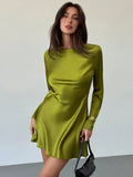 Turn heads in this playful avocado green backless mini dress, designed to spark joy on romantic dates or as a charming choice for wedding guests. Its flirty cut and vibrant color highlight your confidence while keeping things light and fun. Perfect for dancing the night away or stealing the spotlight with effortless style.