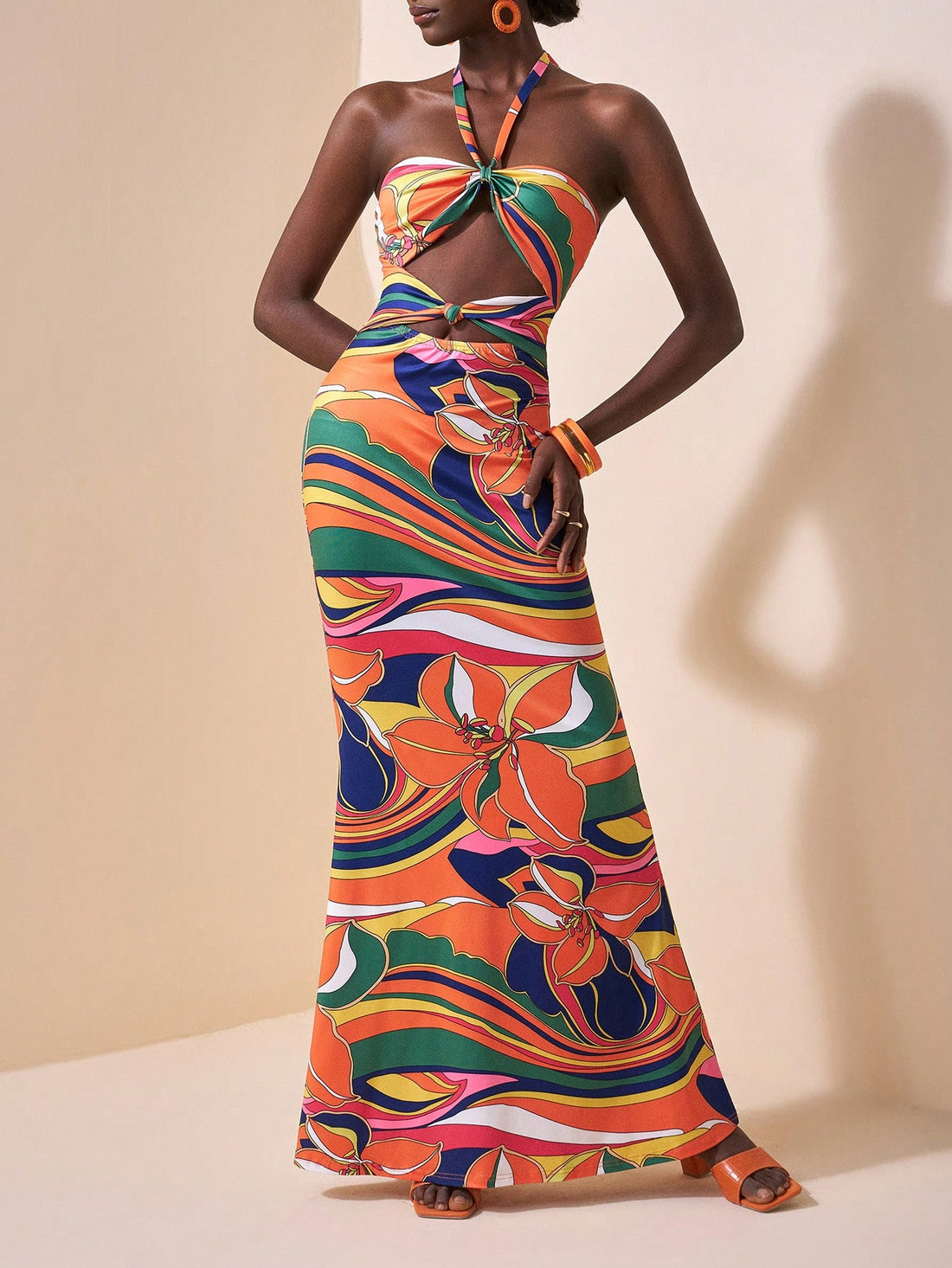 Get ready to slay your summer vacation with our Stylish Backless Halter Neck Mermaid Hem Dress! This dress effortlessly combines style and comfort, making it perfect for all your summer adventures. Show off your back and rock your inner mermaid in this dress that will surely turn heads.