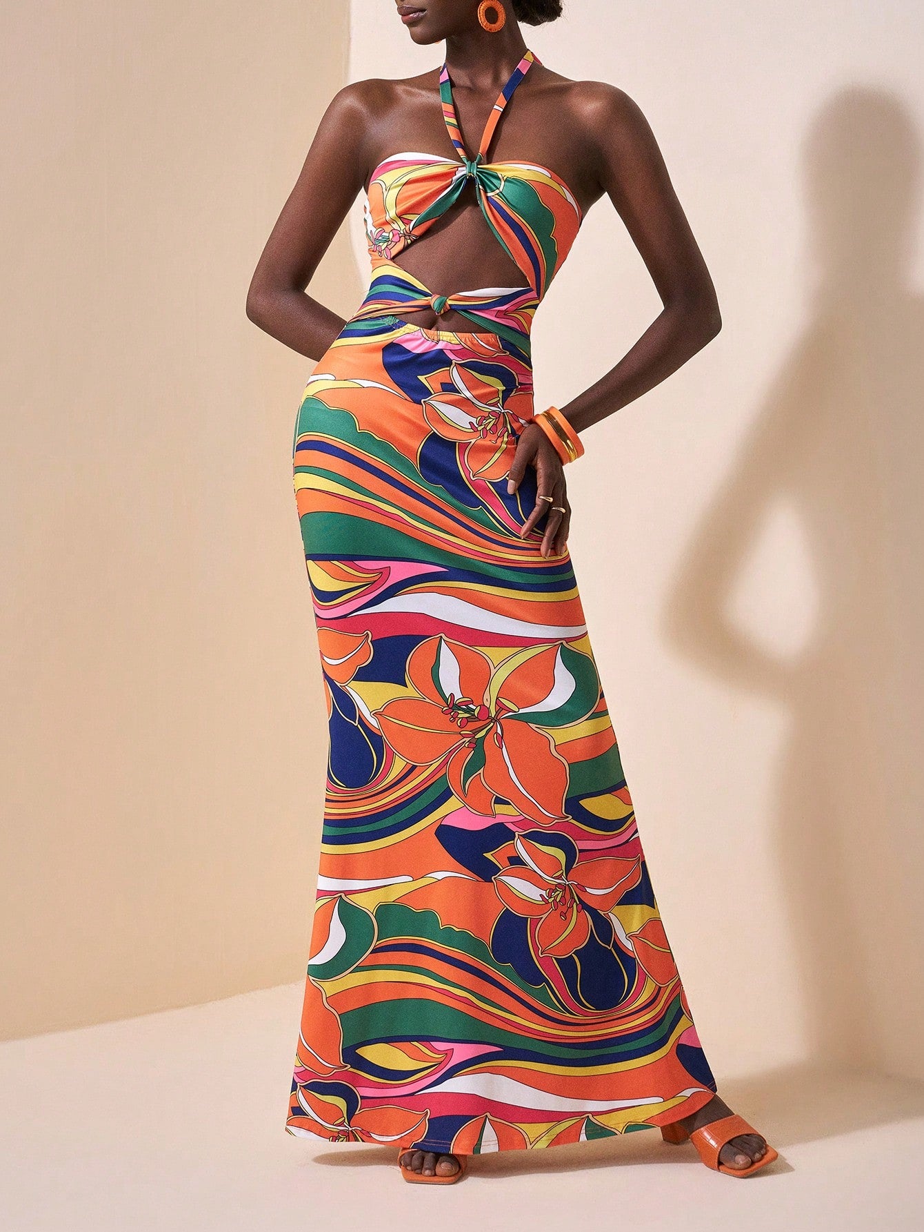 Get ready to slay your summer vacation with our Stylish Backless Halter Neck Mermaid Hem Dress! This dress effortlessly combines style and comfort, making it perfect for all your summer adventures. Show off your back and rock your inner mermaid in this dress that will surely turn heads.