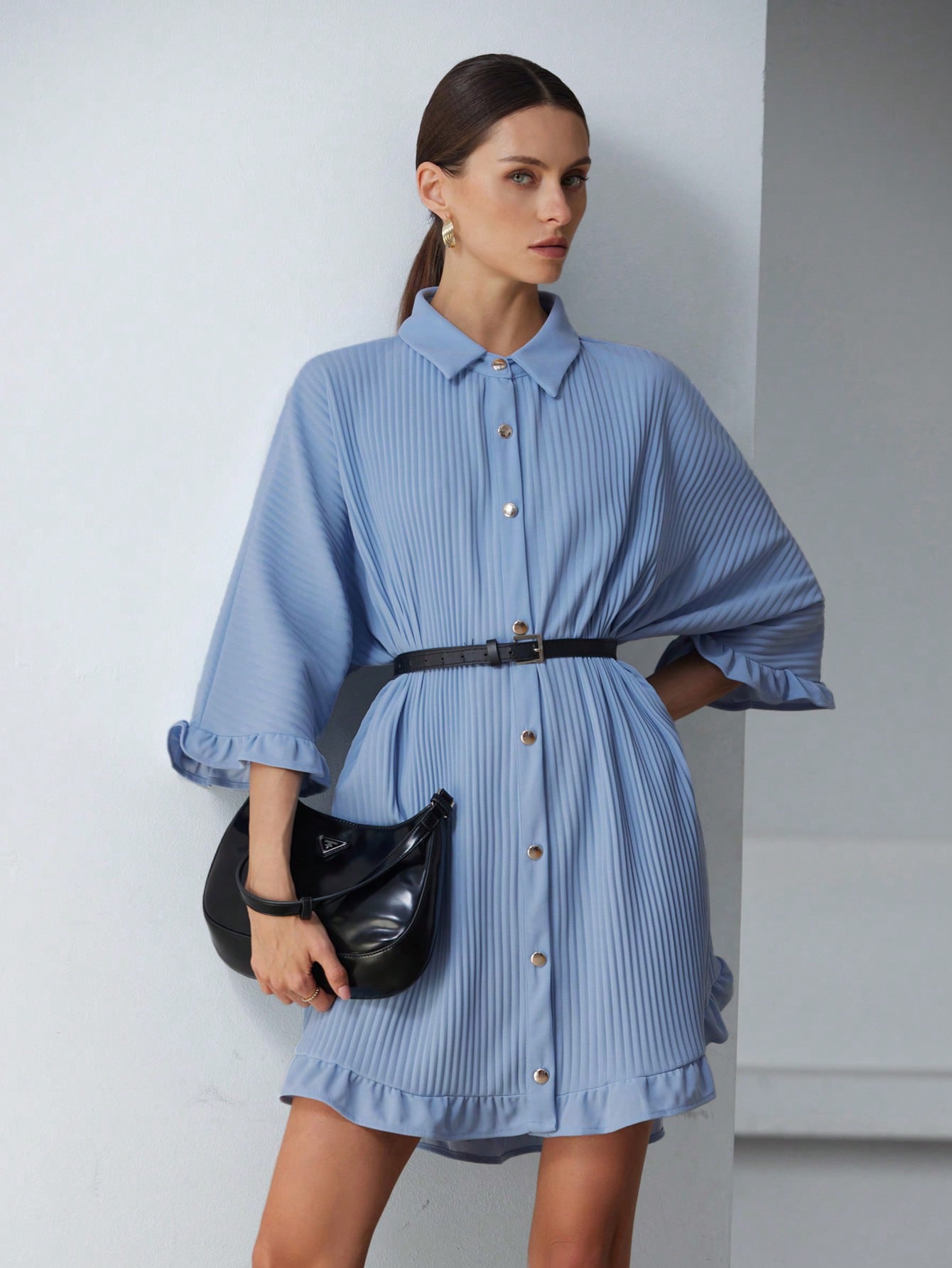 This playful shirt dress features breezy batwing sleeves and a flirty ruffle hem, making it your go-to for effortless vacation vibes. Lightweight and stylish, it’s perfect for sunny strolls or casual beachside dinners. Slip it on and let your carefree spirit shine!