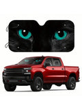 Protect your car from harmful UV rays while adding a touch of quirkiness with this stylish sun shade featuring a black cat design and blue eyes. The suction cups make it easy to install, keeping your car cool and your sense of style intact. (2 exclamations)