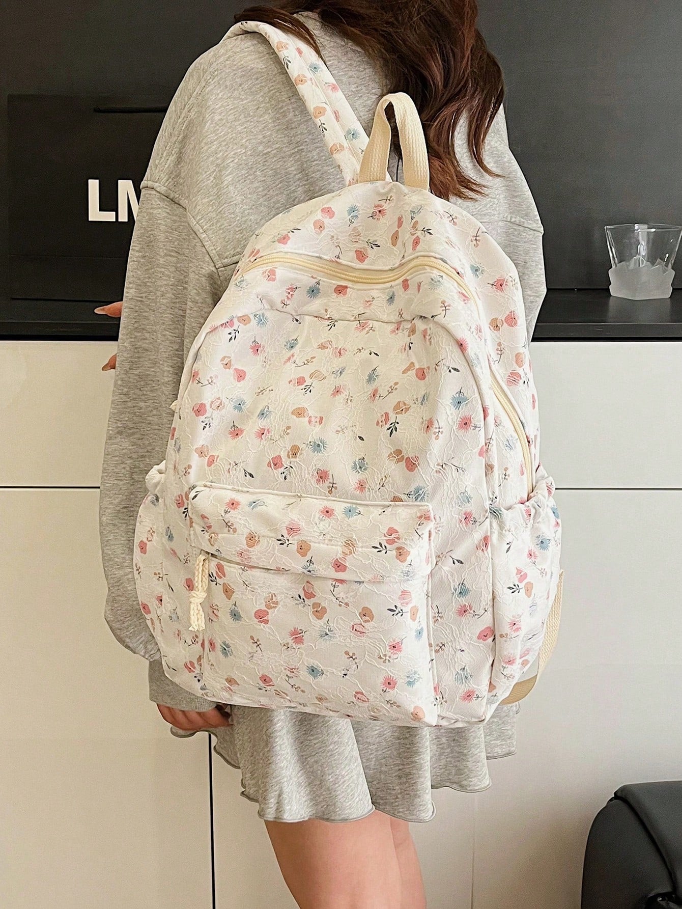 Carry your essentials in style with this playful black floral lace backpack! Featuring a large capacity and multiple pockets, it’s perfect for school, travel, or everyday adventures. The delicate lace design adds a fun, feminine touch while keeping your belongings organized and easy to find. Whether you’re heading to class or exploring new places, this backpack combines practicality with a charming flair.