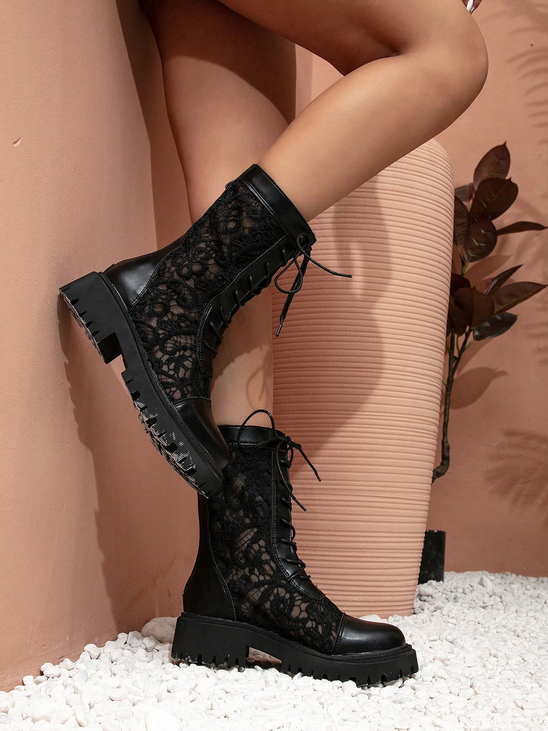 Step into statement-making style with these show-stopping black lace boots! Featuring an eye-catching hollow-out net design, they're the perfect blend of edgy and elegant. The chunky heel and thick platform deliver serious comfort without sacrificing that fierce look—ideal for turning heads through fall and winter. Whether you're dressing up a casual outfit or adding drama to your evening look, these boots are your new go-to for making an entrance.