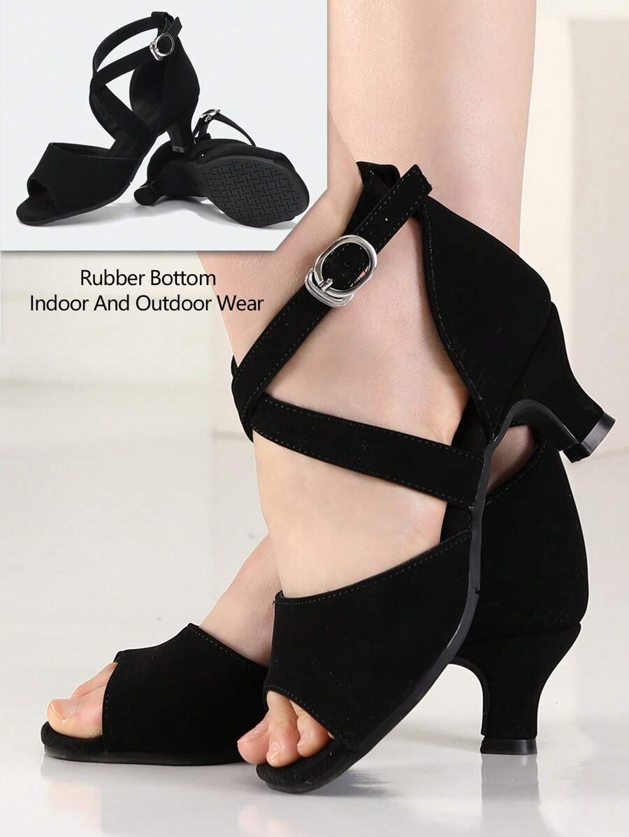 Elevate your dance floor presence with these stunning black Latin dance shoes, engineered for salsa, ballroom, and party settings. Featuring a fabric upper paired with a suedette insole for comfort and support, these women's shoes deliver the flexibility and grip needed for dynamic footwork. The durable rubber outsole ensures reliable traction whether you're dancing indoors or outdoors, while the secure buckle closure keeps your feet locked in place through every spin and step. Designed for both performance