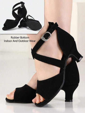 Elevate your dance floor presence with these stunning black Latin dance shoes, engineered for salsa, ballroom, and party settings. Featuring a fabric upper paired with a suedette insole for comfort and support, these women's shoes deliver the flexibility and grip needed for dynamic footwork. The durable rubber outsole ensures reliable traction whether you're dancing indoors or outdoors, while the secure buckle closure keeps your feet locked in place through every spin and step. Designed for both performance