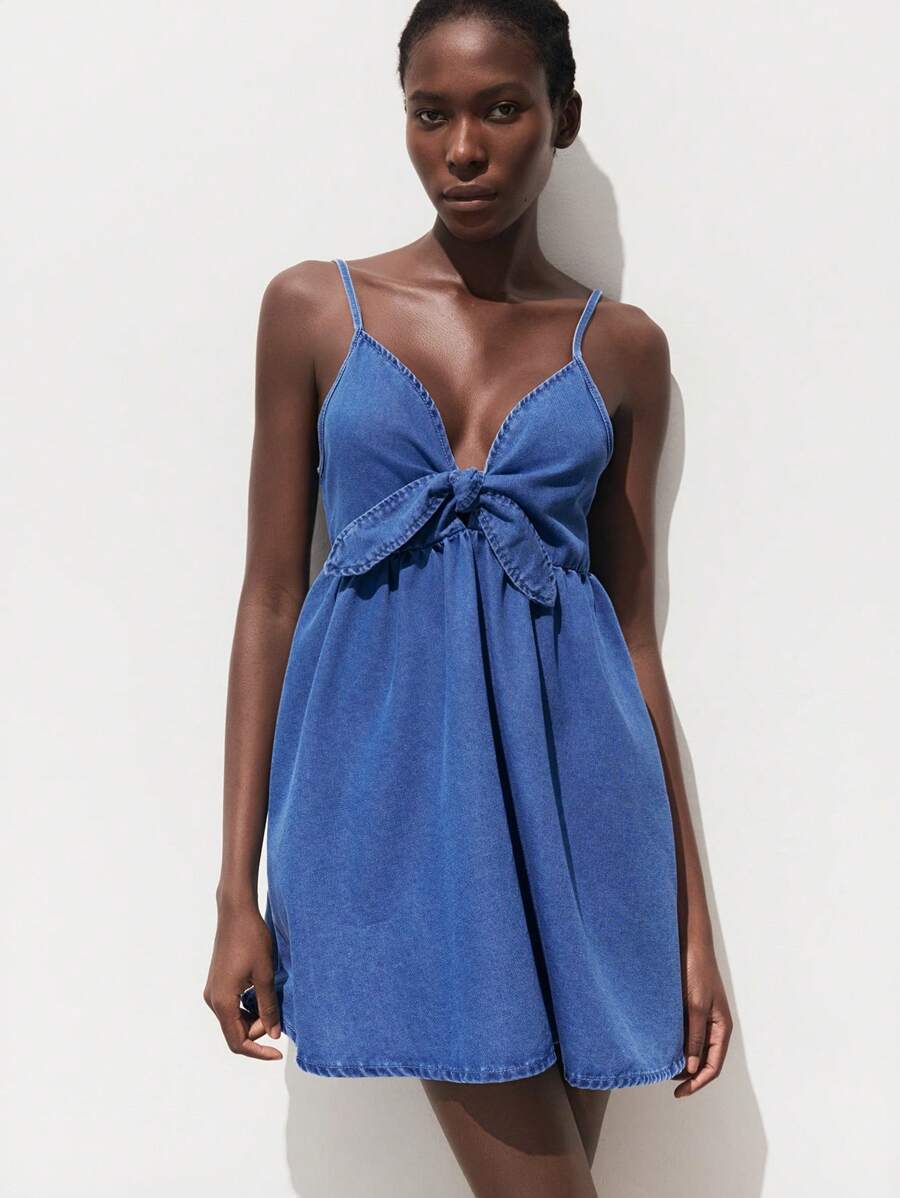 Elevate your summer wardrobe with this charming blue denim suspender dress—the perfect blend of retro vibes and modern style. Featuring classic denim construction with adjustable suspenders, this dress offers both comfort and personality for casual outings, holiday gatherings, and everything in between. The timeless silhouette flatters all body types while the playful design makes a statement wherever you go. Whether you're heading to a picnic, festival, or family celebration, this versatile piece pairs eff