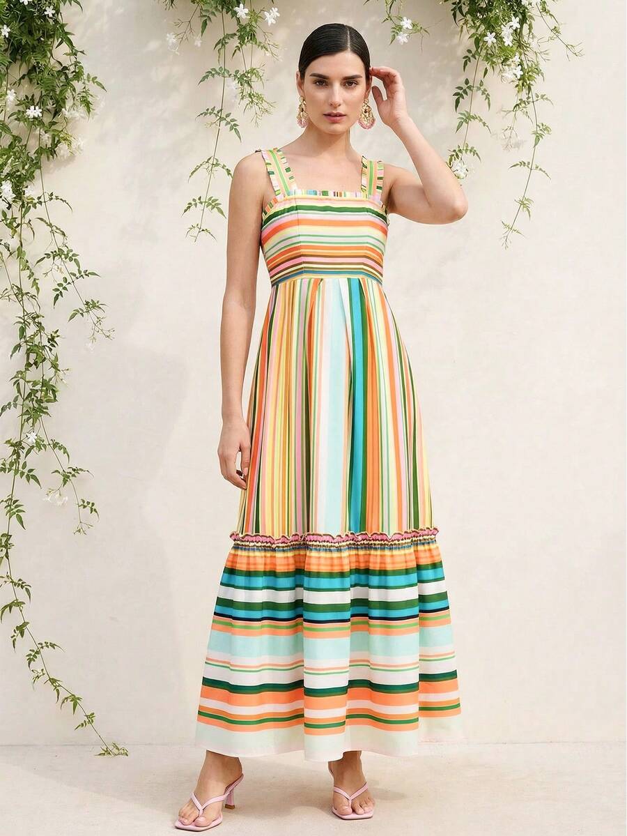 Experience the breathtaking fusion of botanical-inspired heritage and sharp, modern architectural tailoring. This stunning blue-green striped ensemble is meticulously designed for the woman who values a high-fashion, "quiet luxury" approach to seasonal dressing—the ultimate centerpiece for prestigious spring garden parties, exclusive summer retreats, and high-authority coastal soirées.