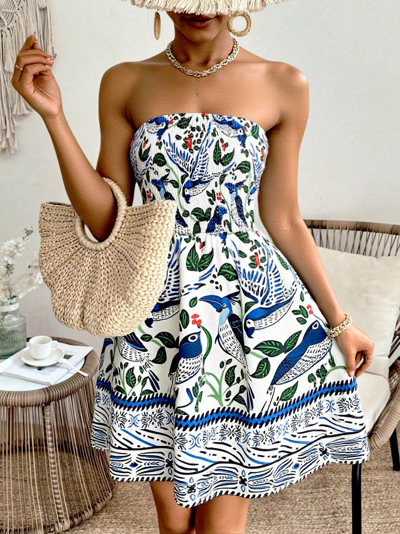 Stay stylish this season with our blue printed open shoulder mini dress! Perfect for both spring/summer vacations and daily wear, this dress is designed to keep you looking and feeling cool. The ruffle detailing adds a fun touch, making it a must-have for your wardrobe.