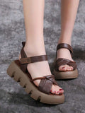 Elevate your summer style with these chic brown platform wedge sandals. Designed for comfort and confidence, they feature an open toe silhouette that keeps your feet cool while the sturdy wedge heel provides all-day support. The non-slip sole ensures stability on any surface, making them perfect for casual outings, beach days, or weekend adventures. The rich brown tone pairs effortlessly with any warm-weather wardrobe. Step into sophistication and comfort this season.