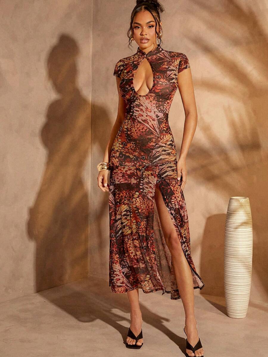 Step into summer with this playful maxi dress featuring a charming butterfly print and flirty cut-out slit. Its breezy design keeps you cool while adding a touch of effortless elegance to your look. Perfect for sunny days and warm evenings, this dress lets you embrace the season with style and comfort.