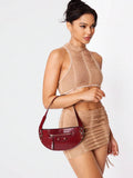 Crocodile skin hobo bag front view with rivet detail
