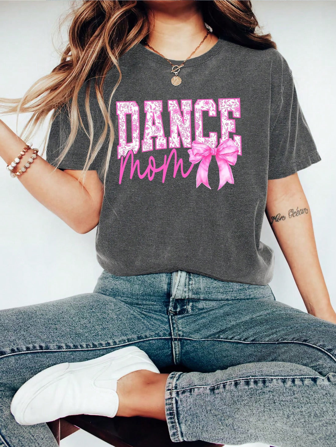 Be the "best dressed dance mom" with our Stylish Dance Moms Floral Graphic Tee! Perfect for Spring and Summer, this casual top boasts a playful design that will have you standing out at the studio. With short sleeves, stay cool and comfortable while you support your dancer.