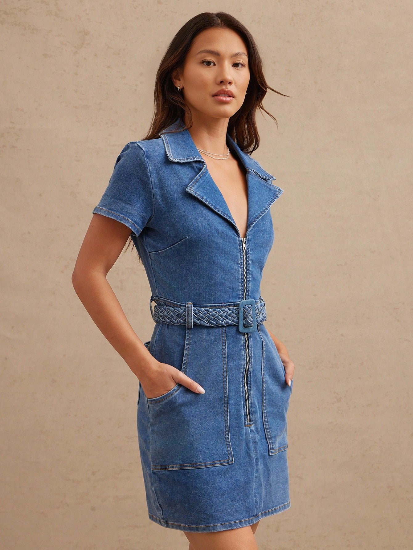 Step into summer rodeo vibes with this playful denim cowgirl dress! Featuring a handy zipper front and a flattering belted fit, it’s perfect for twirling through sunny days or dancing under the stars. Durable yet stylish, this dress blends classic cowgirl charm with modern flair for your next adventure.