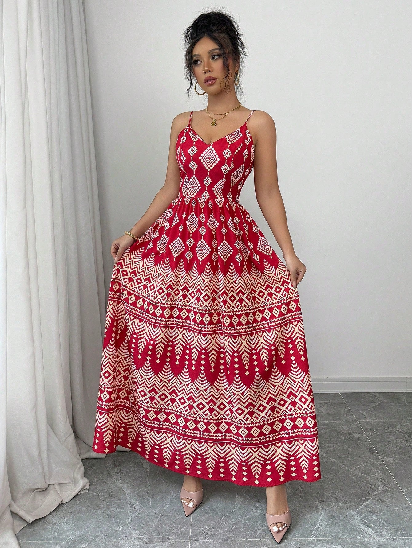 Get ready for effortless vacation elegance with this stylish geometric print dress featuring a playful bowknot and a daring backless design. Perfect for making a statement while staying comfortable. Say goodbye to boring vacation outfits!