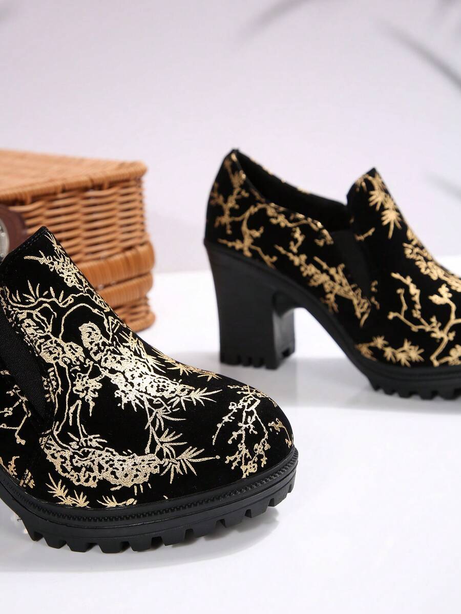 Step into the spotlight with these Stylish Gold Printed High Heel Booties! Perfect for autumn and winter parties, they bring a touch of sparkle to every gathering. The eye-catching gold print pairs effortlessly with your favorite outfits, while the high heels add a flirty boost to your stride. Get ready to dance, mingle, and shine all season long!