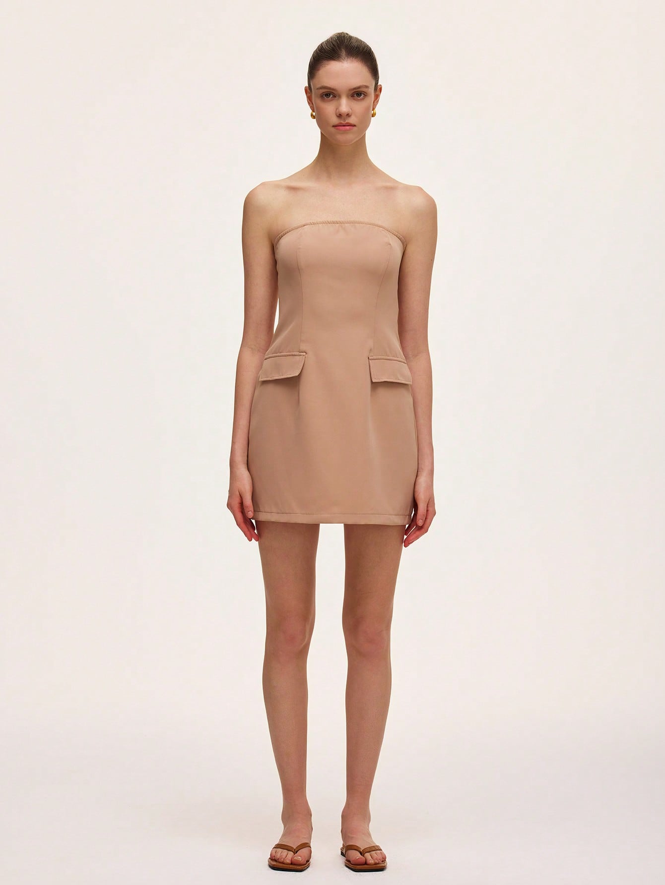 Step out in style with this playful green cold shoulder A-line mini dress. Featuring trendy cut-out shoulders and chic faux flap pockets, it combines fun details with flattering shape. Perfect for sunny days or casual nights, this dress adds a fresh pop of color and effortless charm to your wardrobe.