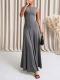 Step into summer with this playful grey sleeveless swing dress, designed to keep you cool and stylish on any vacation. Its breezy silhouette offers comfort and freedom of movement, making it perfect for beach days or city strolls. Effortlessly versatile, this dress pairs well with sandals or sneakers, ensuring you look fabulous wherever your adventures take you.