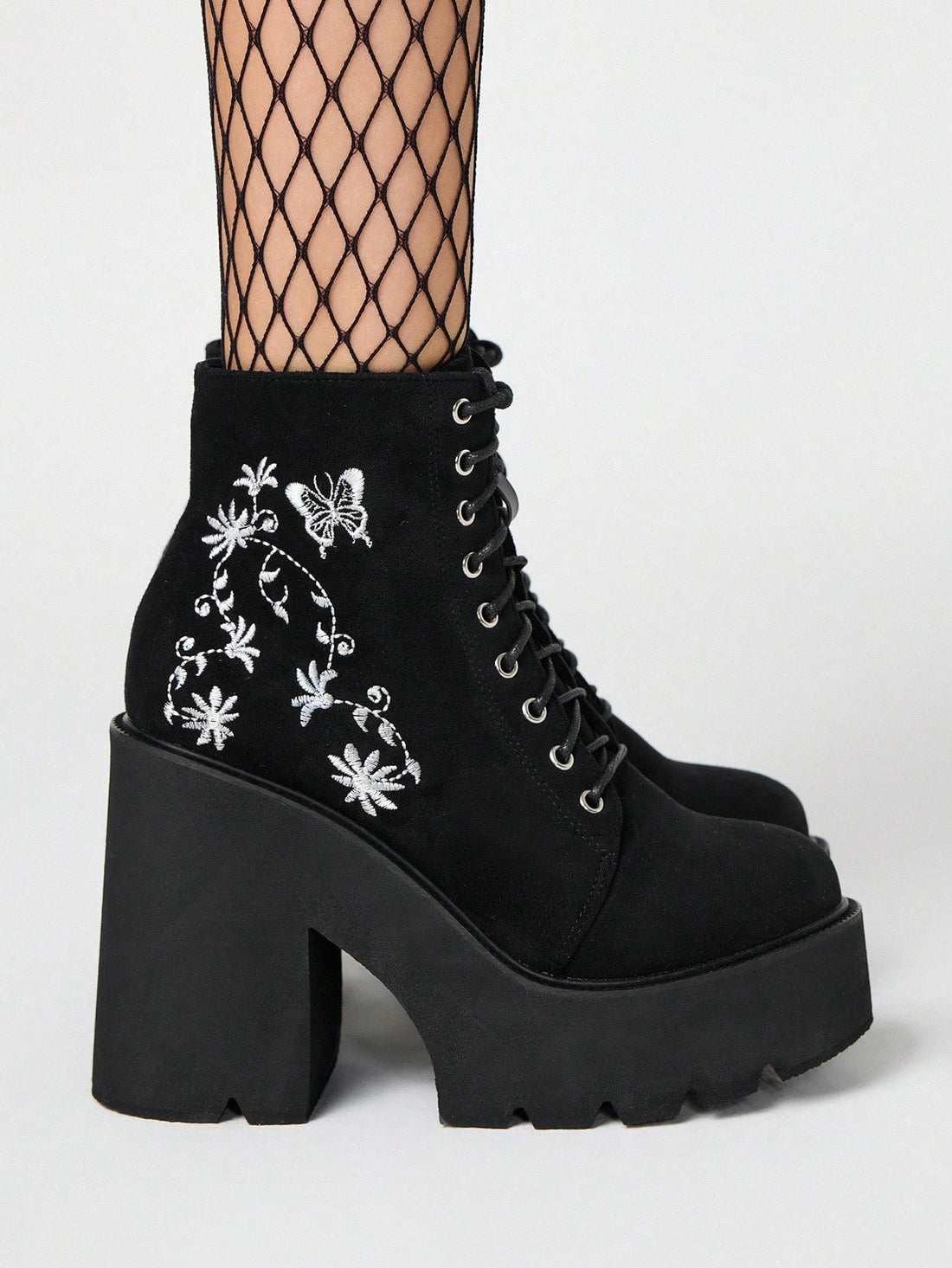Step out boldly with these Stylish Grunge Punk High Heel Boots, perfect for turning heads on your daily commute or lighting up the party. Featuring a retro white waterproof design and sturdy lace-up platform, they blend edgy flair with practical comfort. Dance through rain or shine while rocking a look that’s as fearless and fun as you are!