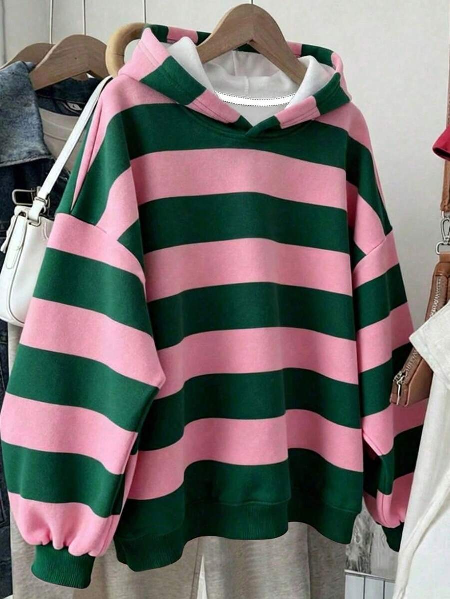 Embrace laid-back coastal vibes with this heather gray hoodie, featuring a vibrant hibiscus flower print that brings tropical flair to your everyday wardrobe. The soft, comfortable fabric makes it ideal for beach outings, casual hangouts, or relaxed evenings. Perfect for layering over swimwear or pairing with your favorite shorts and sandals. Whether you're catching the sunset or staying cozy by the shore, this hoodie delivers effortless style with a touch of island-inspired charm.