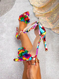 Step into summer style with these eye-catching high heel sandals featuring vibrant butterfly and flower designs. Perfect for adding a pop of color to your warm-weather wardrobe, these sandals blend comfort with fashion-forward flair. Whether you're heading to a garden party, brunch with friends, or a casual night out, these playful heels elevate any outfit. The intricate floral and butterfly details make them a conversation starter, while the sleek silhouette keeps them versatile enough to pair with dresses