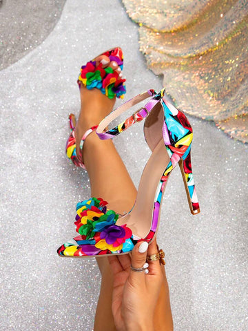 Step into summer style with these eye-catching high heel sandals featuring vibrant butterfly and flower designs. Perfect for adding a pop of color to your warm-weather wardrobe, these sandals blend comfort with fashion-forward flair. Whether you're heading to a garden party, brunch with friends, or a casual night out, these playful heels elevate any outfit. The intricate floral and butterfly details make them a conversation starter, while the sleek silhouette keeps them versatile enough to pair with dresses