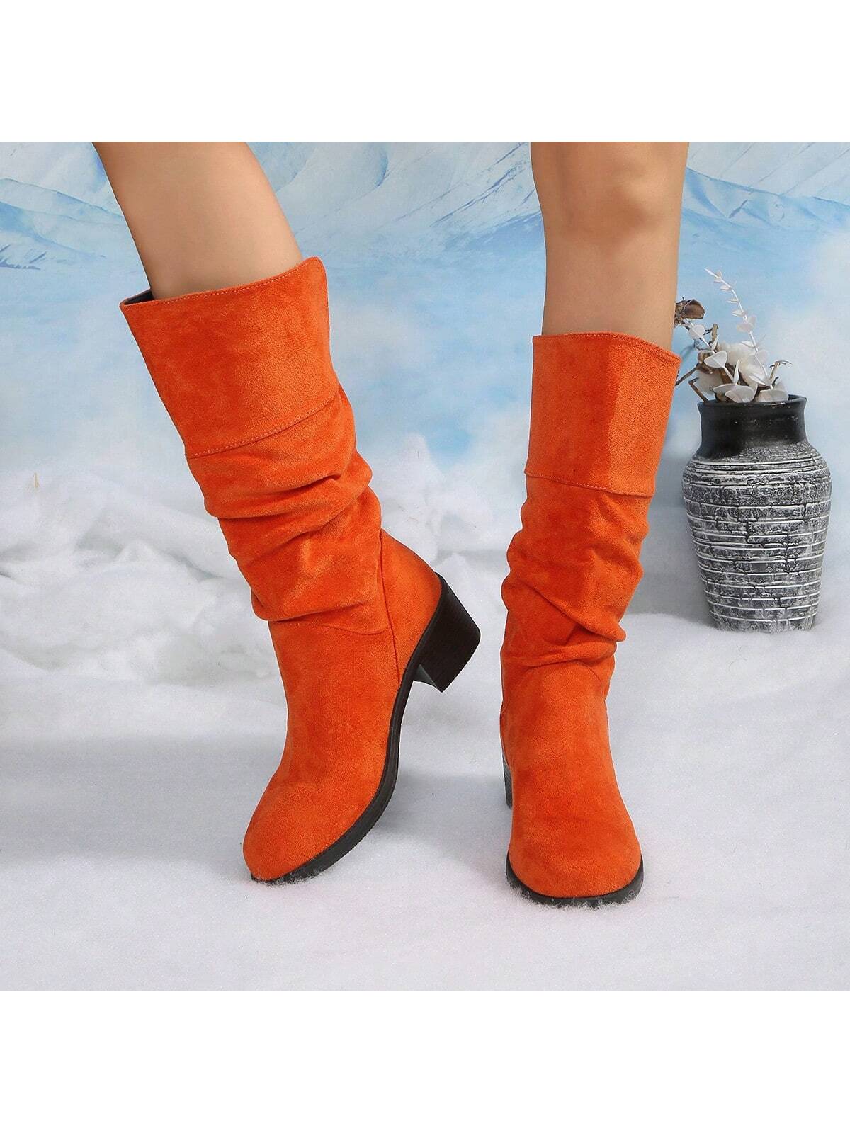 Step into winter with flair in these knee-high pleated boots designed just for fun-loving fashionistas. The cozy, slip-on style keeps your feet warm without any hassle, while chunky heels add a playful bounce to your stride. Perfect for chilly days when you want to stay snug and look effortlessly chic. Pair them with your favorite dress or jeans and watch your winter style soar!