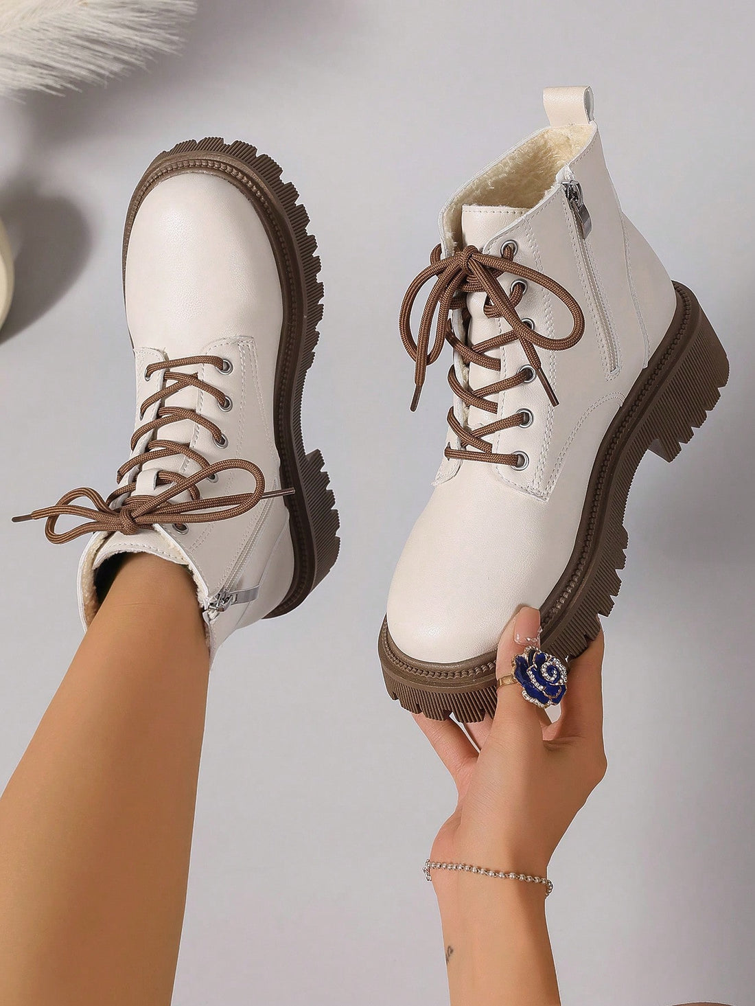 Step out in style with these playful leather ankle boots designed just for you! Perfect for autumn and winter, their flat soles and lace-up design keep your feet comfy and secure all day. Whether you're out for a casual stroll or spicing up your everyday look, these versatile boots add a fun twist to any outfit. Embrace cool-weather fashion with a splash of charm and ease!