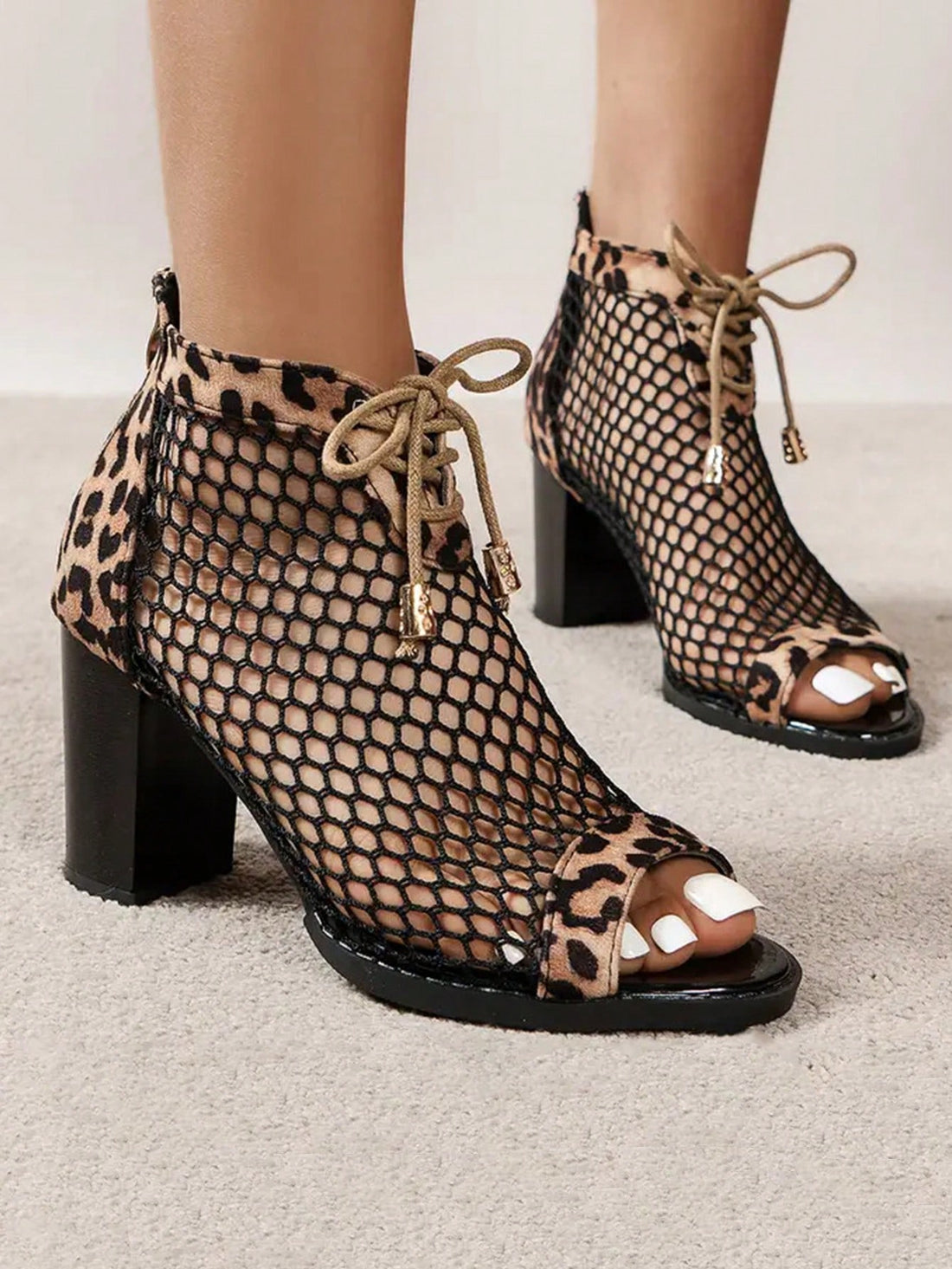 Elevate your outfit with these Stylish Leopard Print High Heels Sandals. The Roman style design adds a touch of sophistication while the plus size fit ensures a comfortable and flattering fit. Perfect for fashion shows, these sandals will make a statement with its trendy leopard print pattern.