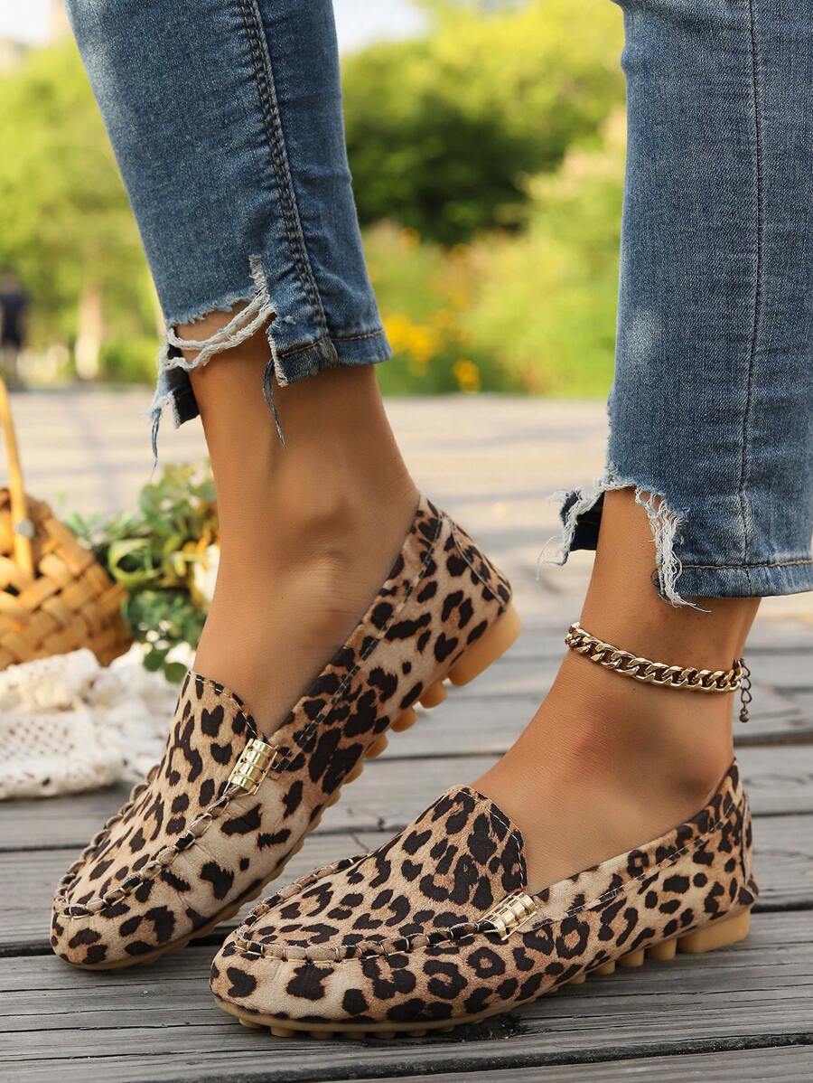 Elevate your casual wardrobe with these stunning leopard print loafers, expertly handcrafted for all-day comfort. The slip-on design features a sleek metal buckle accent that adds a touch of sophistication to any outfit. Perfect for fall and winter, these versatile sneakers transition seamlessly from weekend errands to relaxed social gatherings. The soft, cushioned interior ensures your feet stay comfortable throughout the day, while the eye-catching leopard pattern makes a bold style statement. 