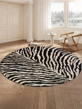 Add a wild touch to your space with this stylish leopard print round rug! Soft underfoot and easy to wash, it brings cozy comfort while staying fresh. The non-slip backing keeps it safely in place, perfect for bedrooms or living rooms ready for a fun, fierce upgrade.