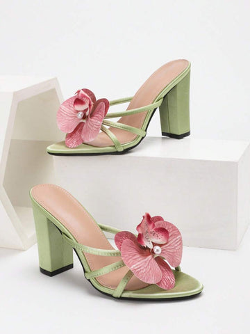 Step into the season with these stunning light green stiletto heels, where botanical elegance meets festive glamour. The intricate 3D orchid detailing adds a whimsical touch that's perfect for holiday parties, vacation celebrations, and special occasions. These eye-catching heels deliver that perfect balance of sophisticated style and playful charm—ideal for anyone ready to make a memorable entrance. Whether you're dancing at a Christmas gathering or celebrating under the sun, these beauties promise comfort