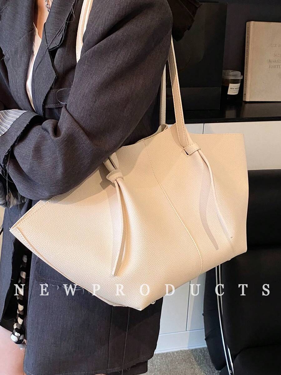 Elevate your everyday with this Stylish Low Tea PU Leather Tote Bag! Featuring a chic dual handle design, it’s your perfect companion for travel, work, or just zooming through your daily adventures. Practical yet fashionable, it holds all your essentials with ease—because your bag should work as hard as you do and look fabulous doing it!