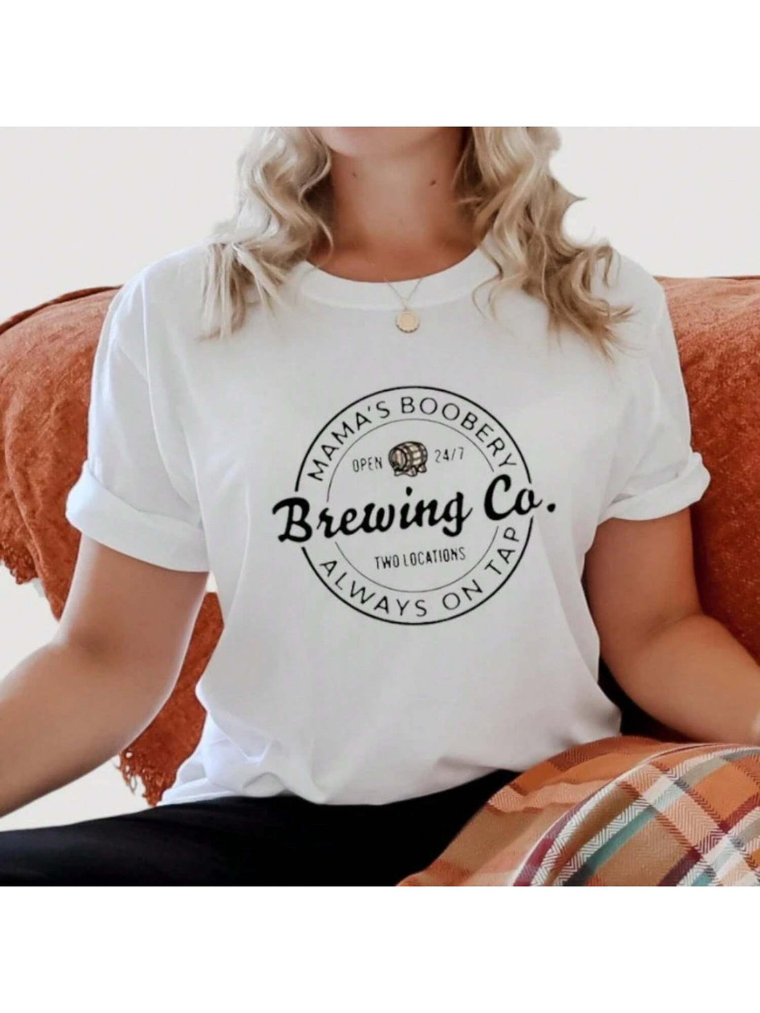 Upgrade your nursing wardrobe with the Stylish Mama's Boobery Nursing T-Shirt. It's the perfect Mother's Day gift for new moms, offering both style and convenience for breastfeeding. Say goodbye to boring nursing tops and hello to comfort with a touch of humor.