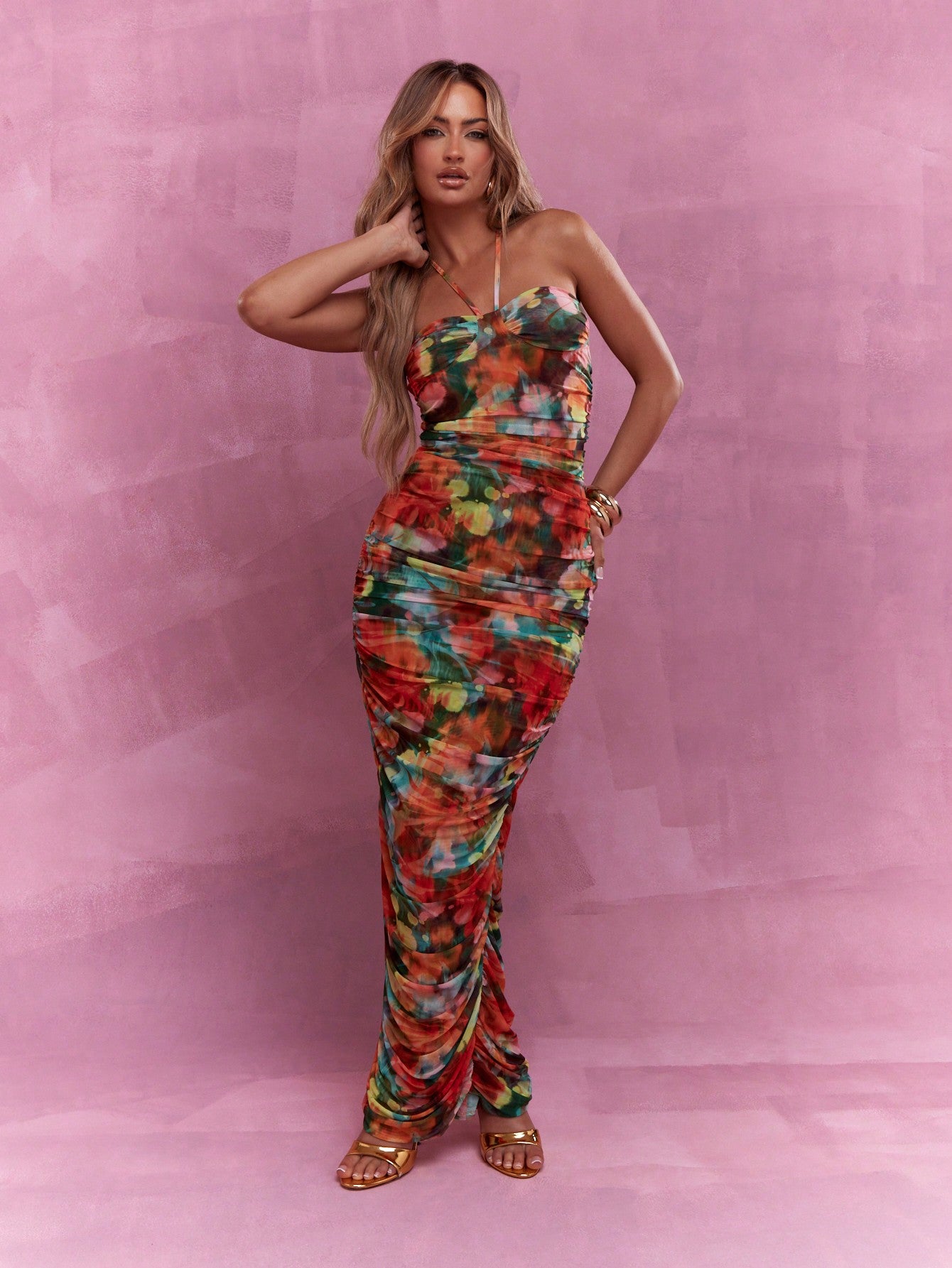 Experience effortless elegance with this Stylish Mesh Halter Neck Ruched Maxi Dress. The mesh halter neck adds a touch of femininity while the ruched detailing creates a flattering silhouette. Perfect for any occasion, this dress will have you looking stylish and feeling confident.