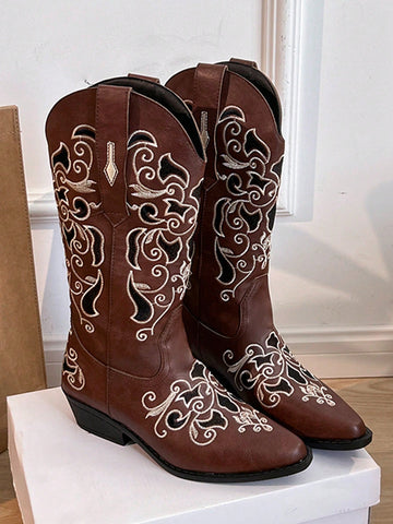 Step into the season with these stylish mid-calf brown boots, featuring eye-catching embroidery that adds a dash of Western flair to your look. Perfect for keeping cozy in autumn and winter, they blend timeless charm with playful spirit. Whether you're hitting the town or strolling through crisp leaves, these boots bring both warmth and wow-factor to every step.