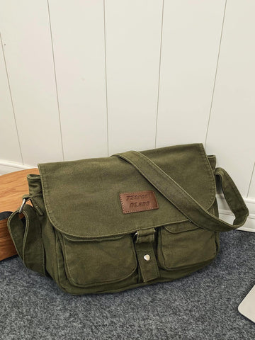 Crafted from durable canvas, this messenger bag combines vintage Japanese aesthetics with practical functionality. The spacious interior accommodates daily essentials, while strategically placed pockets keep smaller items organized and accessible. Its structured silhouette and adjustable shoulder strap provide comfortable, hands-free carrying for work, travel, or casual outings. The retro Harajuku-inspired design adds character to any wardrobe, making it equally suited for fashion-forward styling or underst