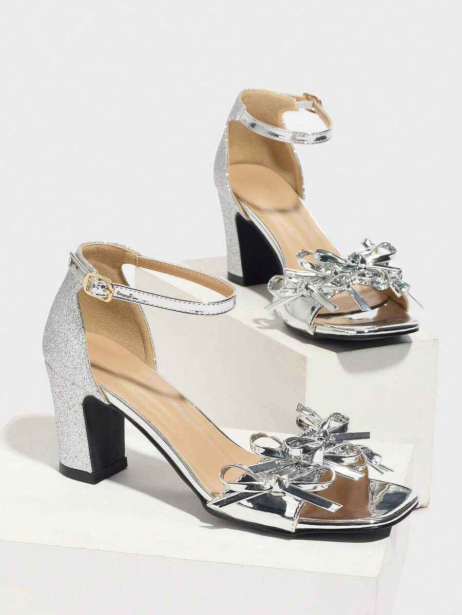 Step into glamour with these stunning open-toe high heel sandals that blend sophistication with fun. Featuring a bold chunky golden design, these beauties elevate any outfit from casual brunch to evening events. The comfortable high heel silhouette flatters your legs while the eye-catching metallic accents add that perfect touch of sparkle. Whether you're dressing up for a special night out or want to feel fabulous on an everyday adventure, these versatile sandals deliver style that turns heads. Slip them o