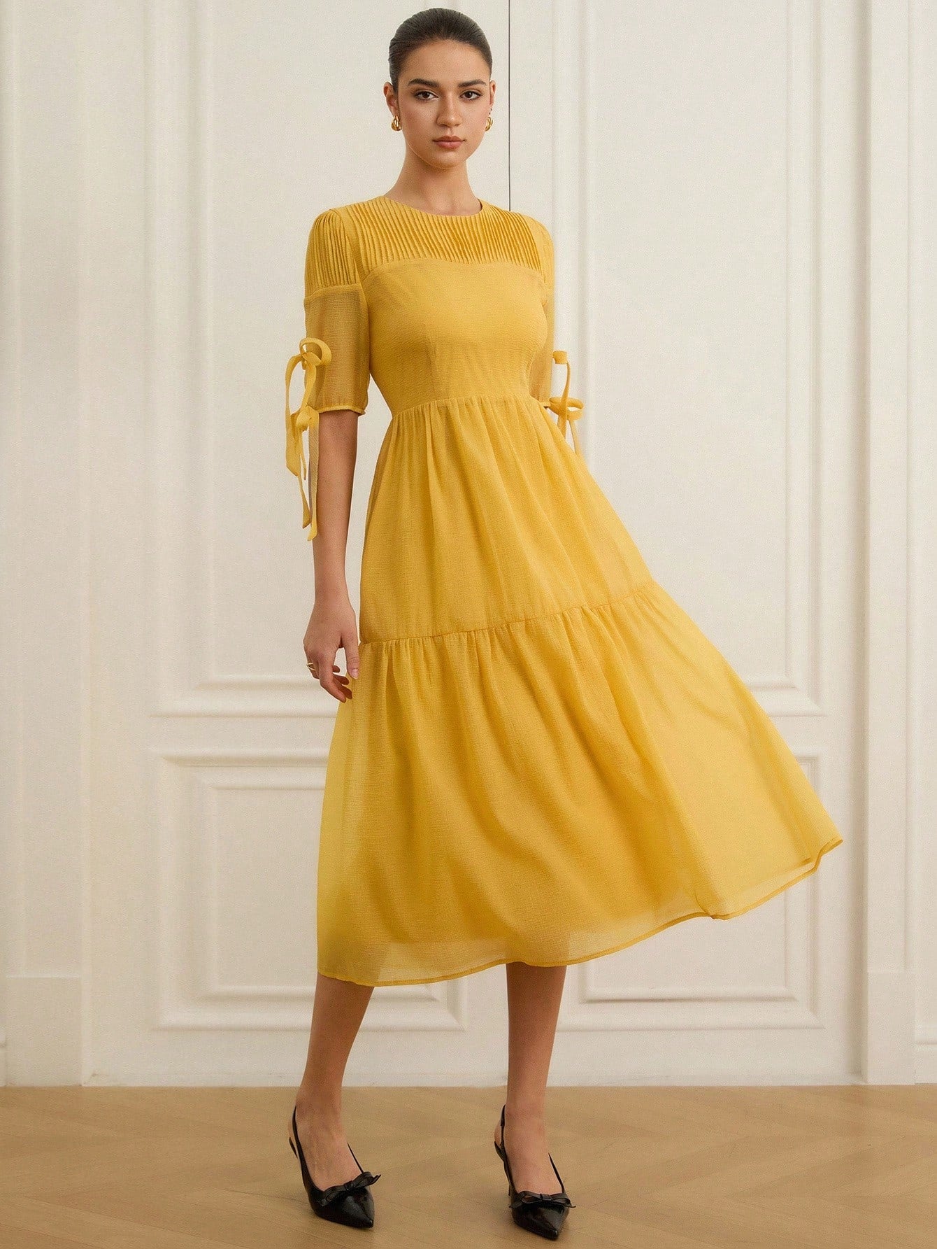 Dance through sunny days with this Stylish Pleated Chiffon Midi Dress, perfect for summer festivals and beach getaways. Its lightweight chiffon fabric flows effortlessly, while the playful pleats add a touch of twirl-worthy charm. Designed to keep you cool and comfortable, this dress is your go-to for breezy adventures and sun-soaked fun.