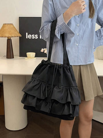 Add a touch of whimsy to your travels with this Stylish Pleated Lace Drawstring Tote Bag. Its delicate lace and playful pleats create a charming look, while the drawstring closure keeps your essentials secure. Perfect for casual outings or exploring new places, this Japanese-inspired shoulder handbag combines fashion and function in one delightful package.