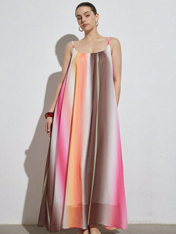 Celebrate vibrant style and comfort with this plus-size maxi dress featuring a playful rainbow gradient. Its flattering V-neck and sleeveless design keep you cool and confident, perfect for casual outings or beach days. Flowing fabric moves with you, making every step feel like a breeze of fun and color.