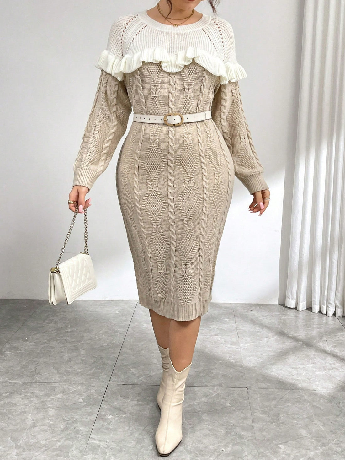 Step into cozy chic with this Stylish Plus Size Autumn Winter Sweater Dress. Featuring a playful ruffle hem and eye-catching color blocks, it brings fun flair to chilly days. Soft knit fabric keeps you warm and comfy, while the flattering shape celebrates your curves with confidence. Perfect for layering or wearing solo, this dress turns autumn and winter wardrobes into a stylish adventure.