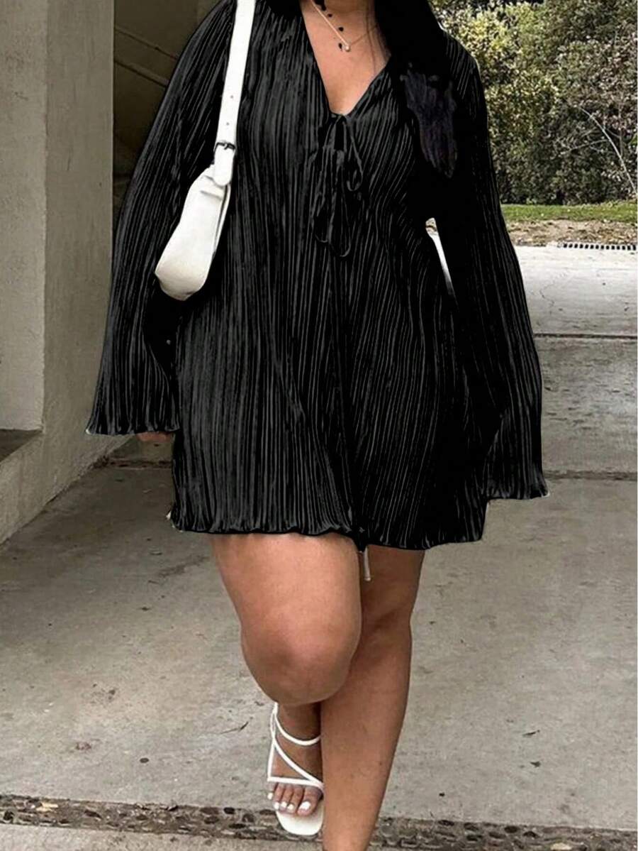 Embrace your curves with confidence in this fabulous plus-size summer dress! Designed with a flattering belted waist that cinches in all the right places, this beauty features a slimming silhouette that celebrates your shape. The charming bell sleeves add a touch of whimsy and movement, perfect for breezy warm-weather days. Whether you're heading to brunch, a garden party, or a casual weekend outing, this dress delivers style and comfort without compromise. The thoughtful construction ensures you'll feel as