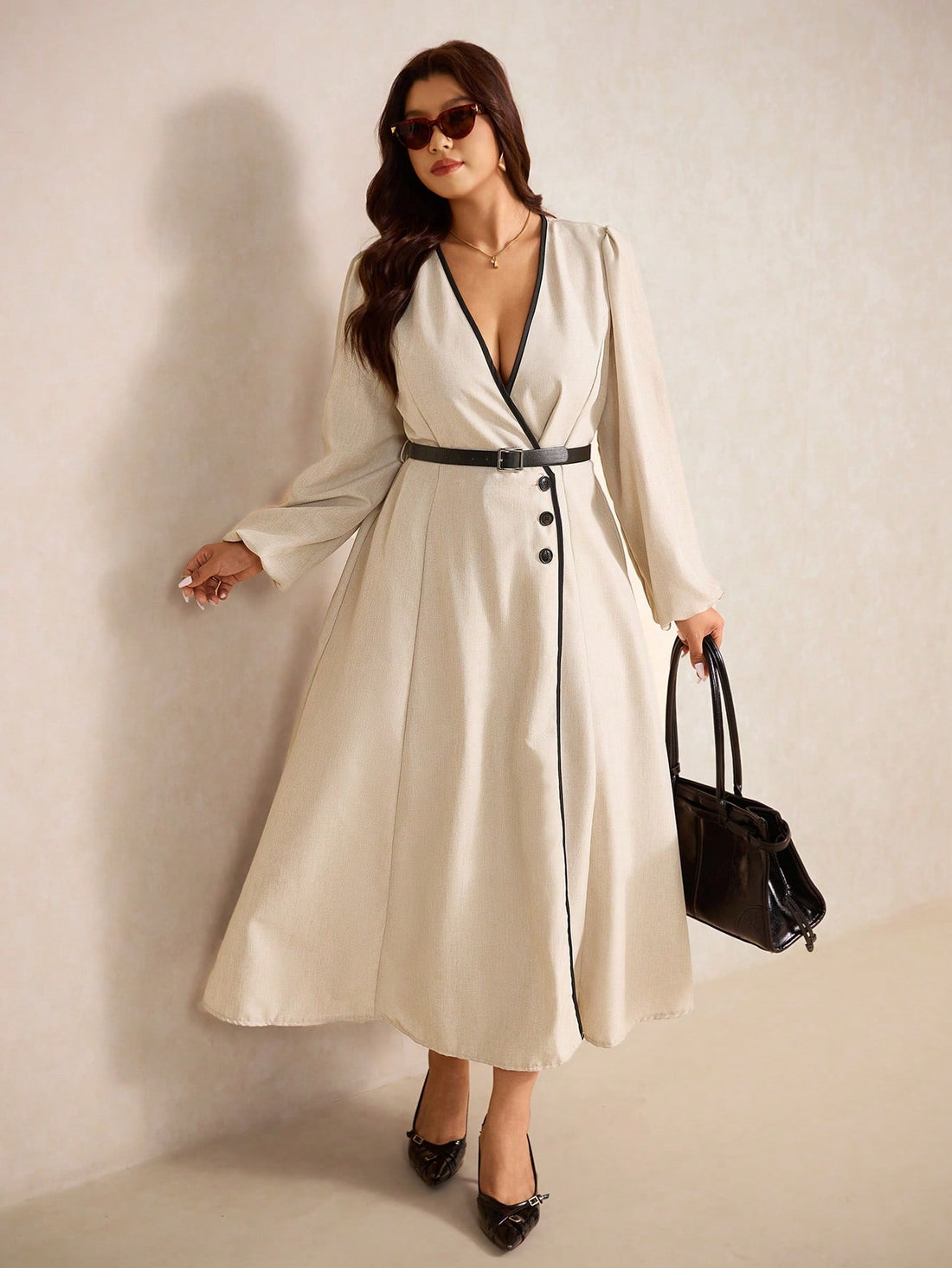 Elevate your everyday style with this fabulous plus-size color block dress that's made for the modern commuter. Featuring eye-catching trim details and a chic silhouette, this piece effortlessly transitions from office to weekend plans. The thoughtful color blocking adds visual interest while the comfortable fit keeps you feeling confident all day long. Perfect for anyone who refuses to compromise on style, this dress proves that fashion-forward doesn't have to mean complicated. Grab yours and show your com