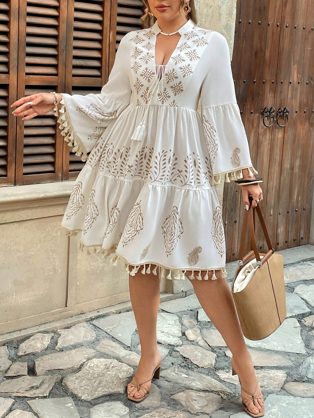 Embrace your free-spirited style with our Plus Size Deep V-Neck Bohemian Dress! The flirty V-neckline and playful tassel trim add just the right amount of fun to your warm-weather wardrobe. Sleeveless design keeps you cool while the boho vibes keep you looking hot! Perfect for everything from beach days to festival nights.