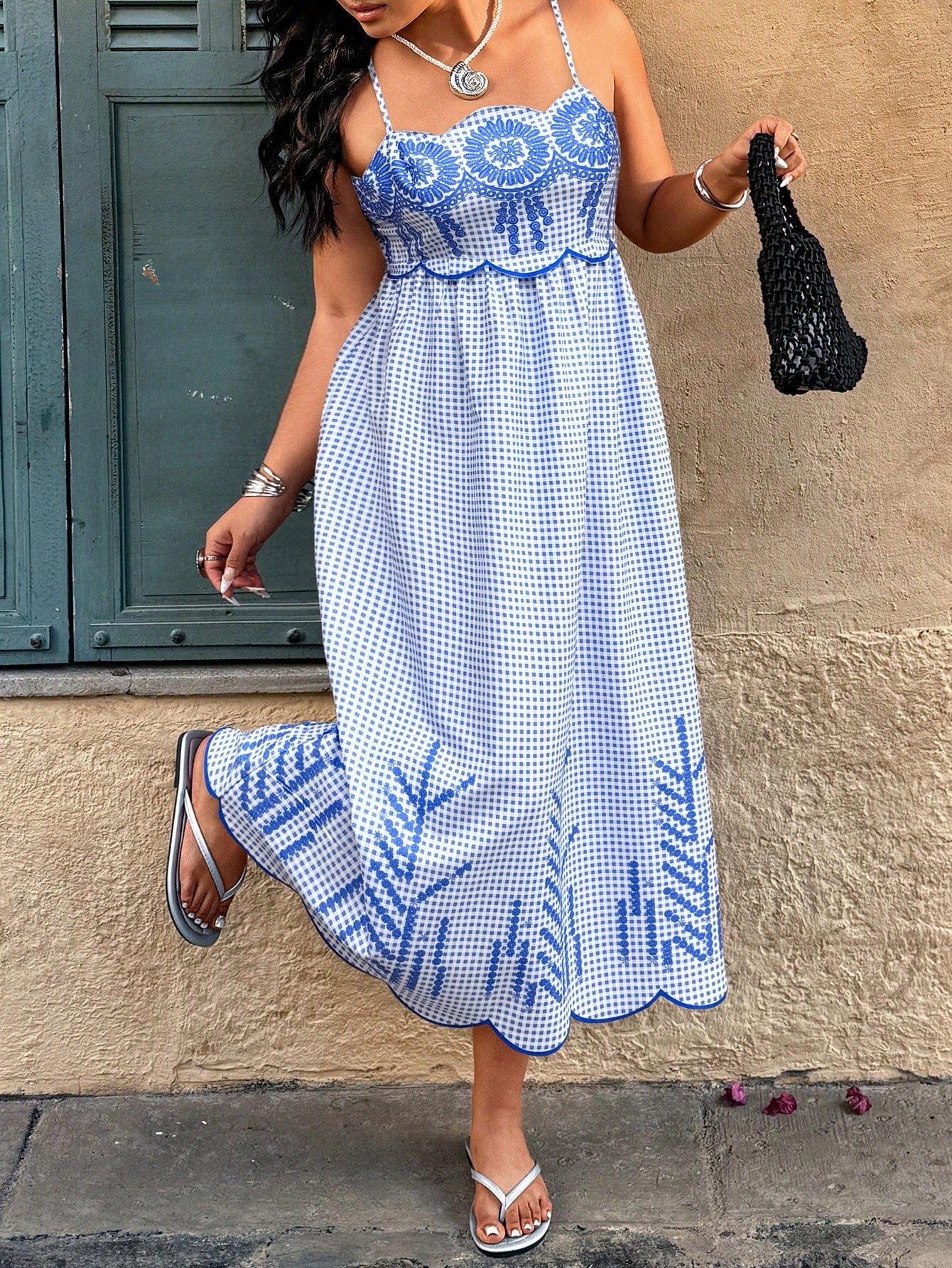 Embrace sunny days in this playful plus size embroidered plaid dress, perfect for casual summer outings. Its vibrant plaid pattern and delicate embroidery add a fun, stylish touch, while the comfortable fit keeps you cool and confident all day long. Whether you're strolling through the park or meeting friends for brunch, this dress brings effortless charm to your warm-weather wardrobe.