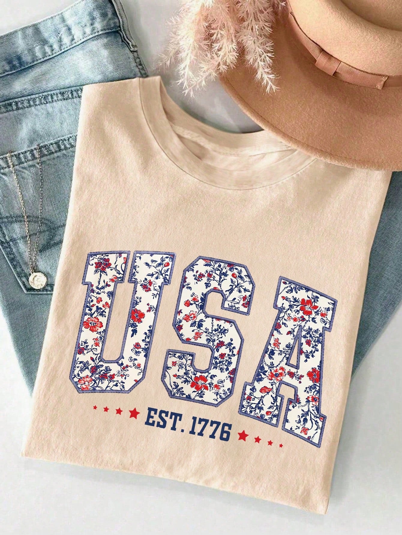 Embrace summer vibes with this eye-catching plus size tee! The playful floral letter print adds a pop of personality to your casual wardrobe. Perfectly roomy and oh-so-comfy, this T-shirt lets you flaunt your style while keeping cool during those sunny adventures. Pair with shorts, jeans, or skirts for an instant mood-boosting outfit!