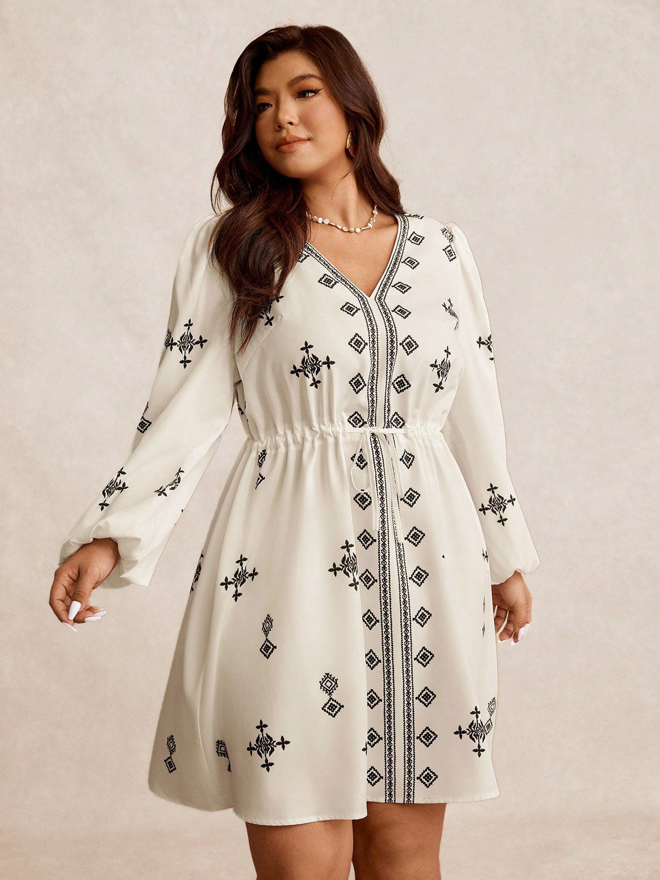 Embrace your curves with confidence in this stunning plus-size dress that's all about celebrating you! Featuring a chic placement print that flatters your figure and a ruched waist that cinches in all the right places, this dress delivers effortless elegance for any occasion. The thoughtful design creates a gorgeous silhouette while keeping you comfortable and fabulous. Whether you're heading to brunch, a night out, or anywhere in between, this wardrobe essential proves that style has no size limit. Slip it