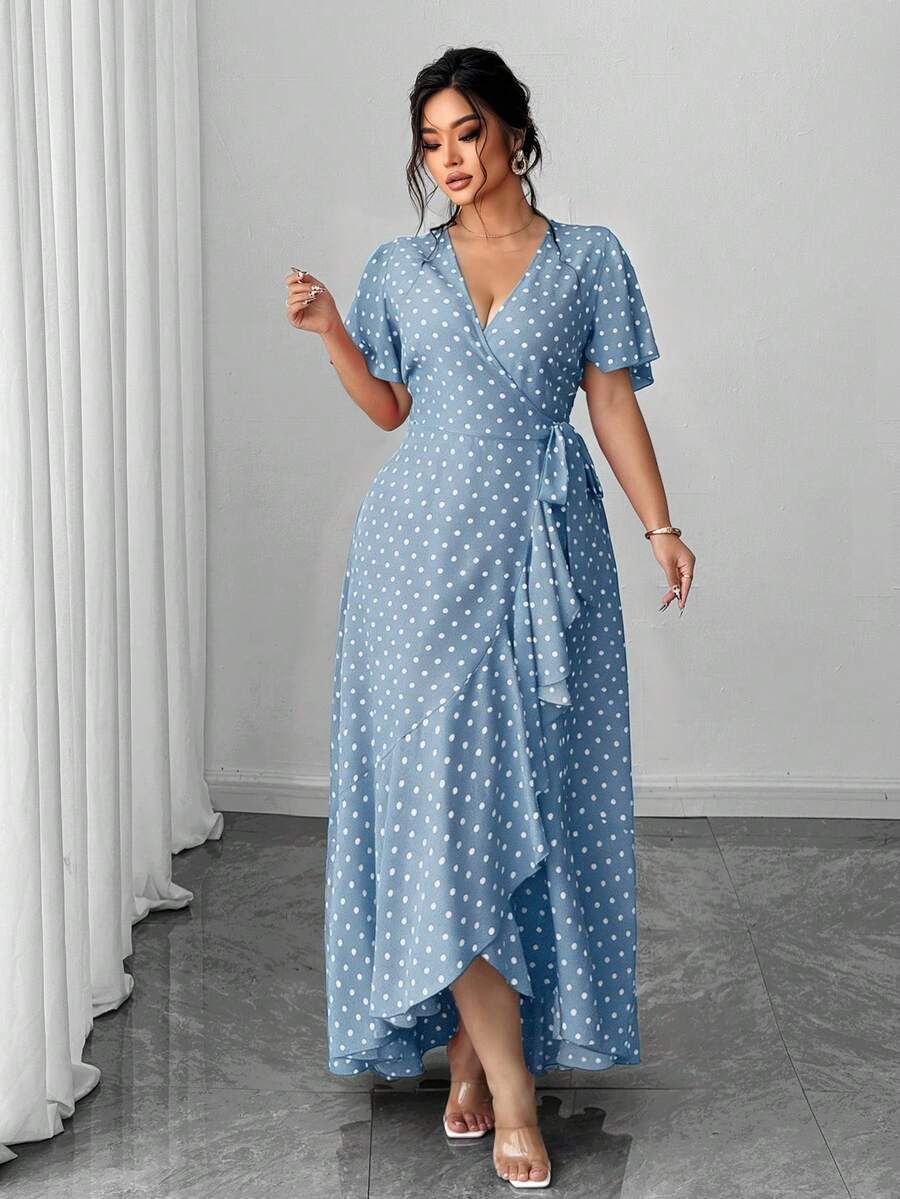 Embrace timeless style with this charming plus-size wrap dress, featuring a classic polka dot pattern that flatters every figure. The adjustable tie waist creates a custom fit while defining your silhouette, while the playful ruffle hem adds movement and dimension. Crafted for comfort and versatility, this dress transitions effortlessly from casual outings to special occasions. Perfect for those who appreciate feminine details without compromising on ease of wear.